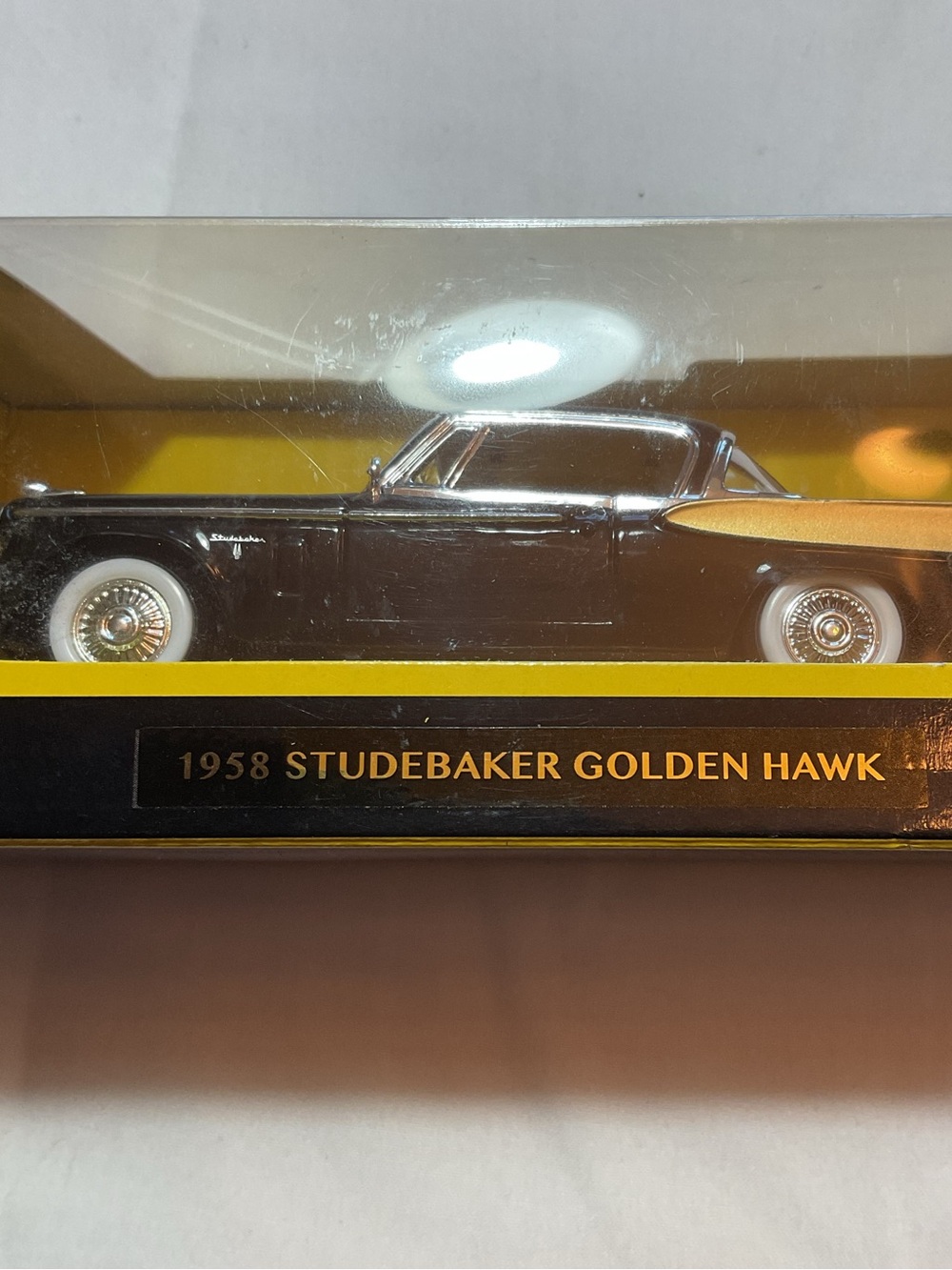 Road Signature 1958 Studebaker Golden Hawk Diecast Car - Black with Gold Accent